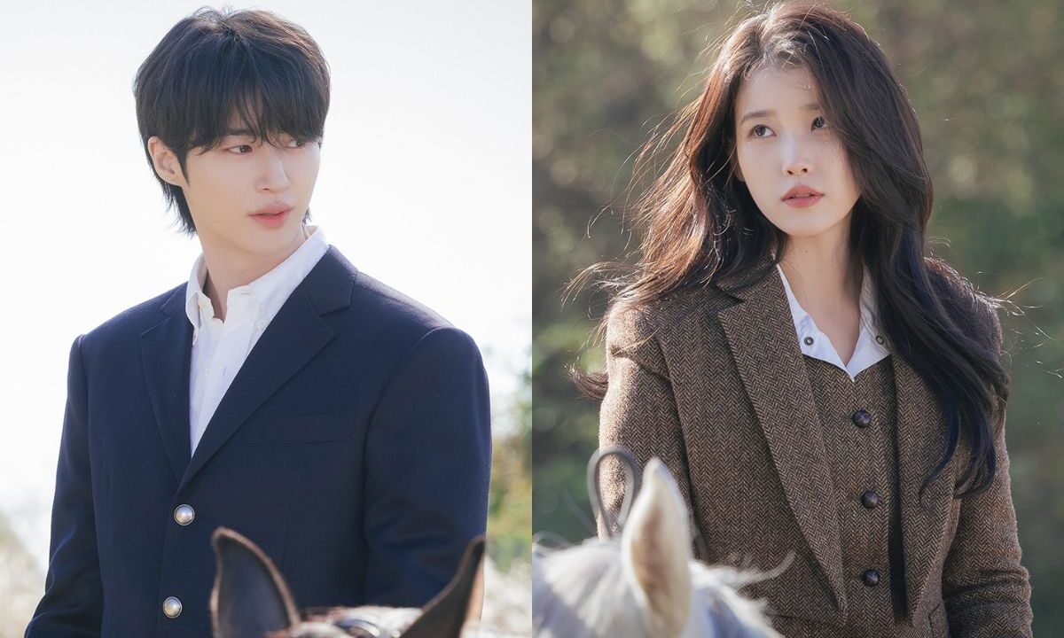 Os atores Byeon Woo-seok e IU caracterizados com figurinos de época em cena do k-drama A Coroa Perfeita.