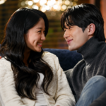 Sol and Sun-jae embracing in the snow as he confesses he has recovered all his memories of the time travel in the finale of Lovely Runner.