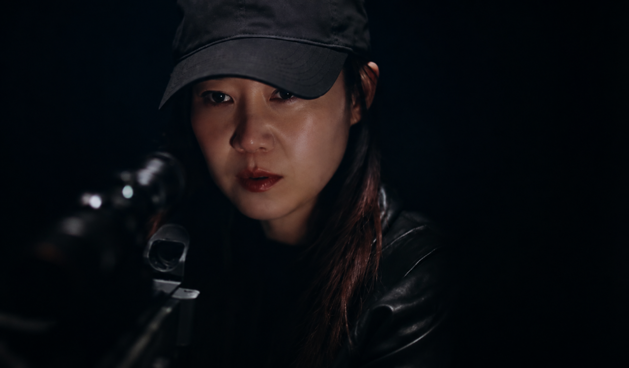 A atriz Gong Hyo Jin no papel da atiradora Yoo Bo Na.