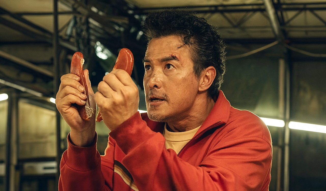 Christopher Lee como Felix Chiang na série The Fixers